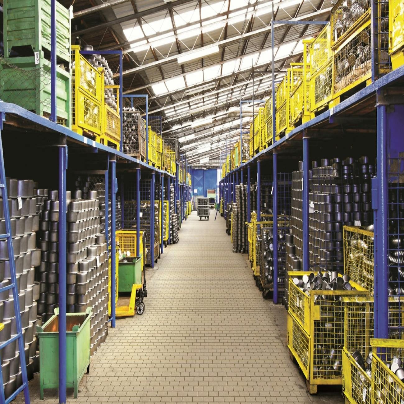 Worker wearing safety gear on factory floor